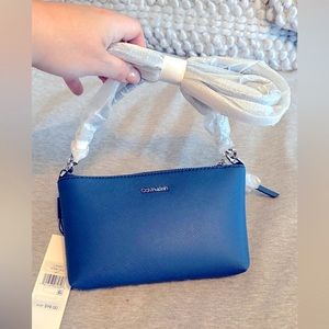 Blue Calvin Klein crossbody purse bag